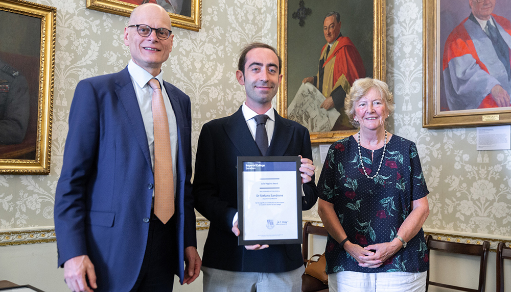 Provost Ian Walmsley and Professor Dame Julia Higgins presenting Dr Sandrone with his award last year