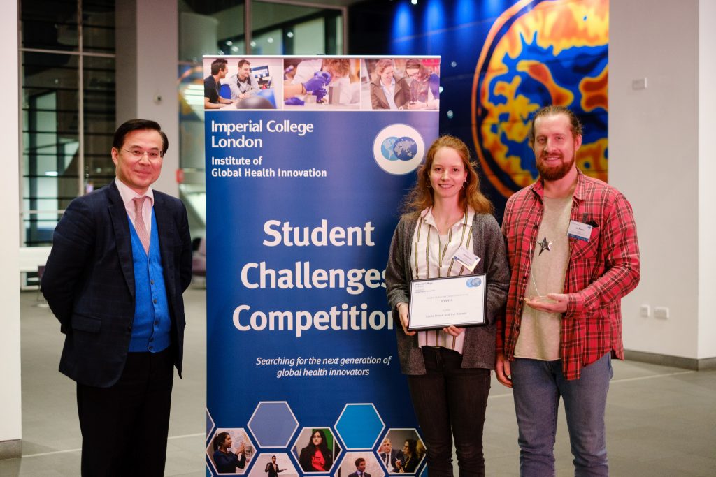 Laura and Kai being awarded first prize at IGHI's Student Challenges Competition.
