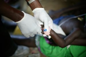 A child being given a drip