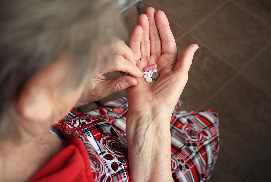 A woman taking her medicine