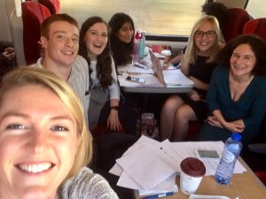 The co-production team on a train