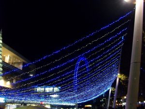 Christmas lights with the London Eye behind, at the Winter Festival, Southbank Centre